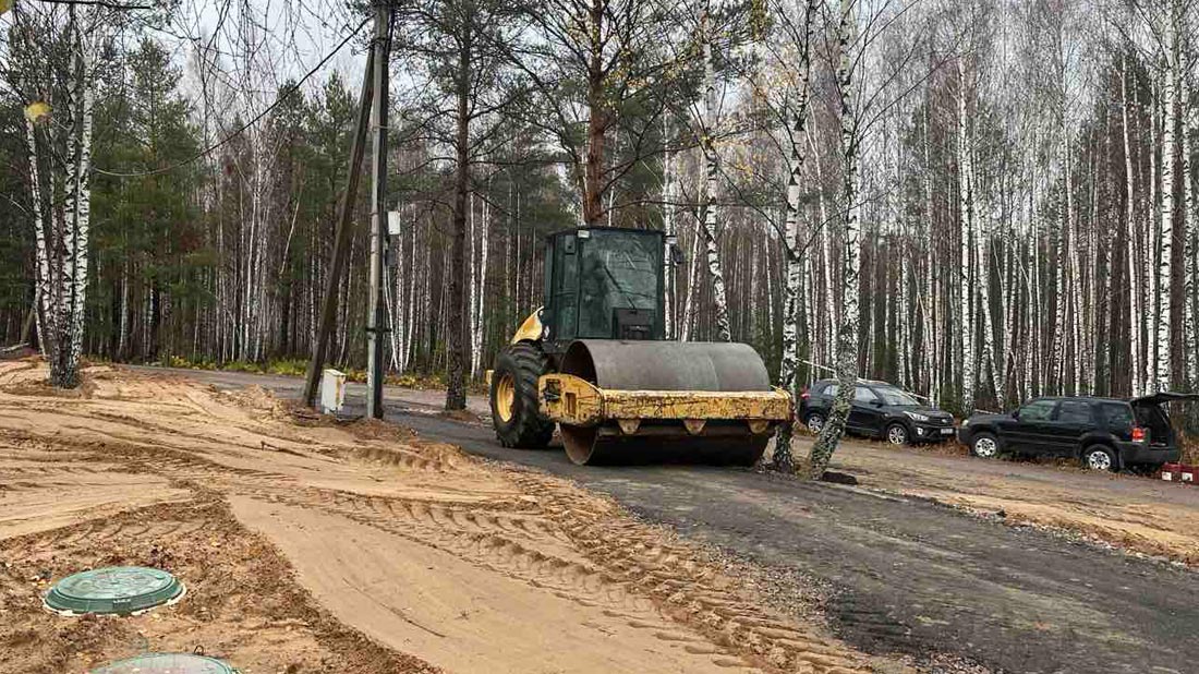 Аренда виброкатка CAT Caterpillar CS-563E для уплотнения подъездной дороги в Минске